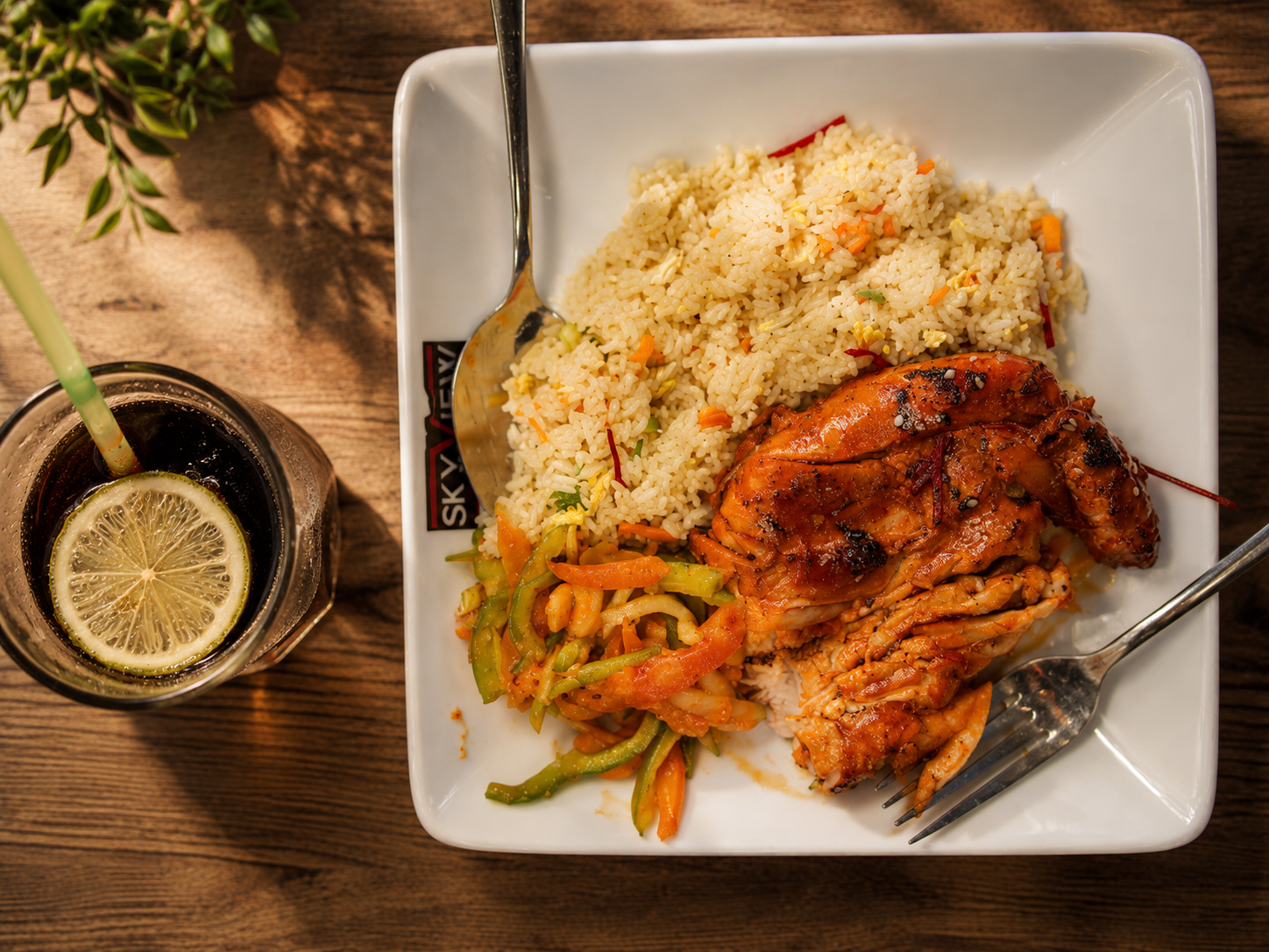 Teriyaki chicken with fried rice and stir fried vegetables